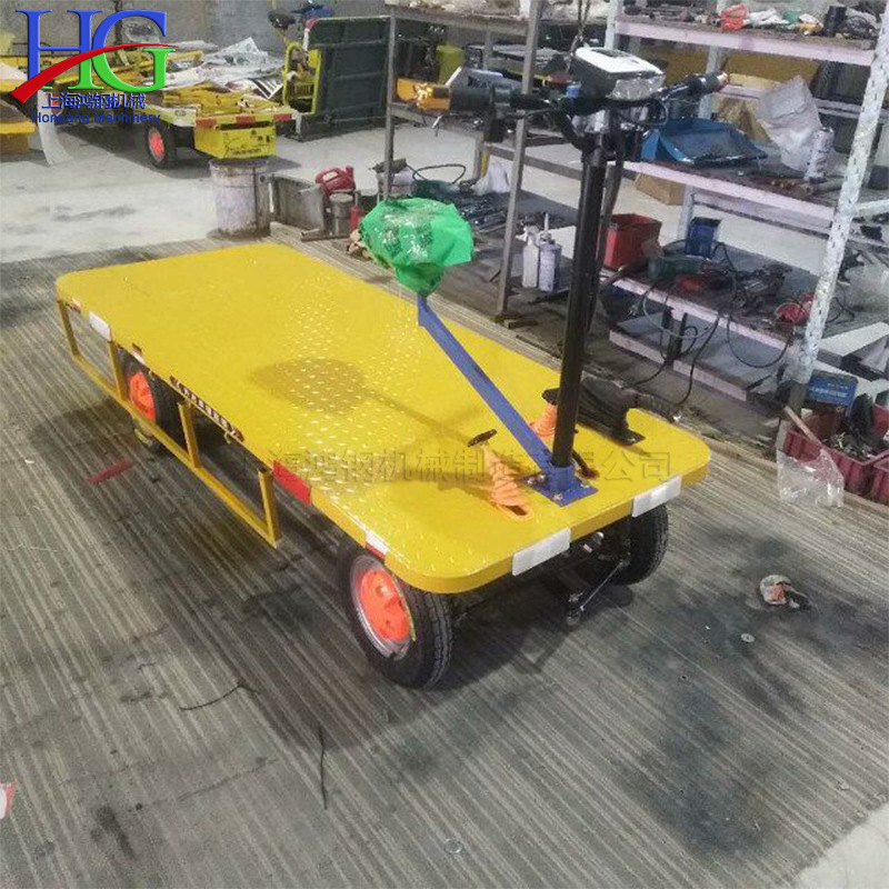 高效便捷的工業(yè)搬運(yùn)助手 鐵路建設(shè)平板運(yùn)料車(chē)與座駕式電動(dòng)搬運(yùn)車(chē)